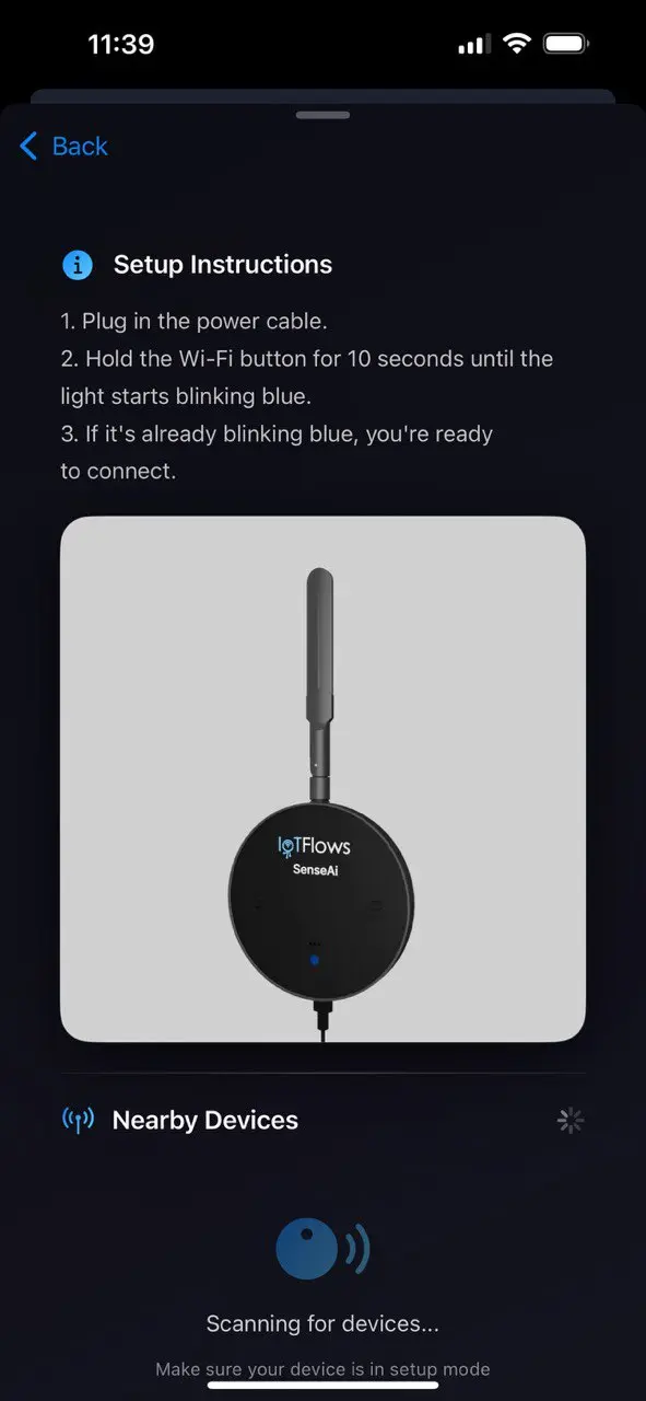 Setup instructions for holding the Wi-Fi button, above a Nearby Devices panel showing Scanning for devices