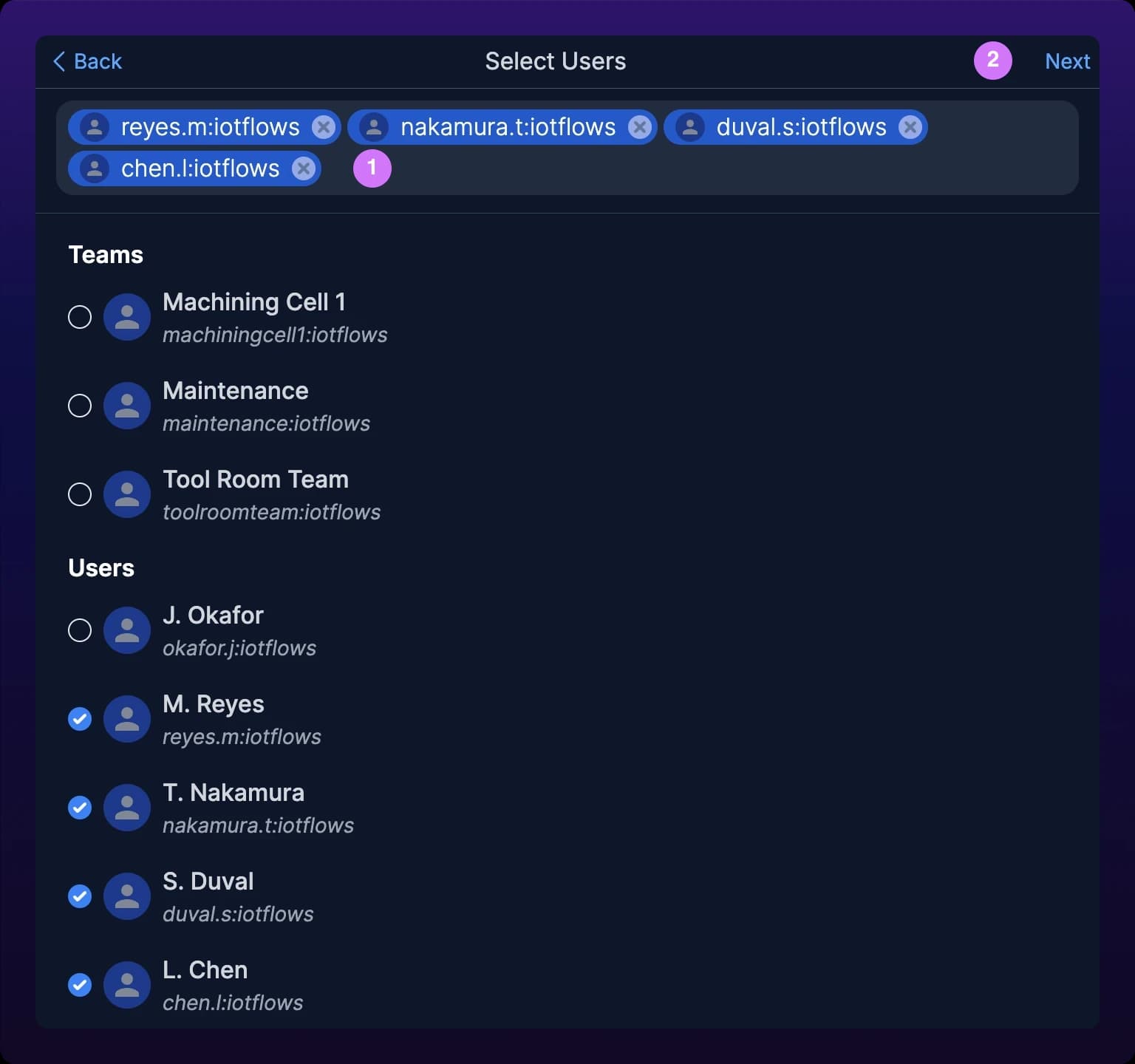 The Select Users screen of the group flow with four chosen members shown as chips above the list, and the Next button active at the top right